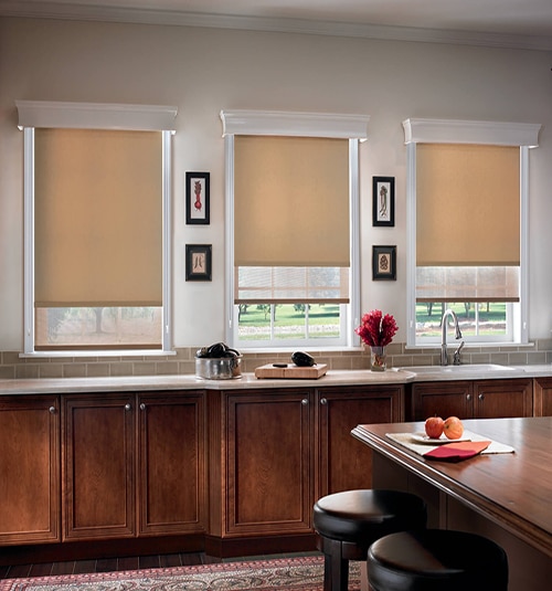Bali Regal Wood Cornice Shown in Snowstorm with Bali Roller Shades