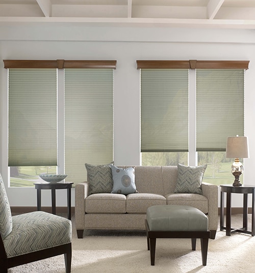 Bali Regal Wood Cornice Shown in Majestic Walnut with Bali Pleated Shades