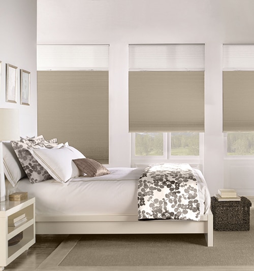 Bali Cordless Sun Up Sun Down Cellular Shades shown in color Luxe Snowbird Light Filtering and Earthy Taupe Blackout