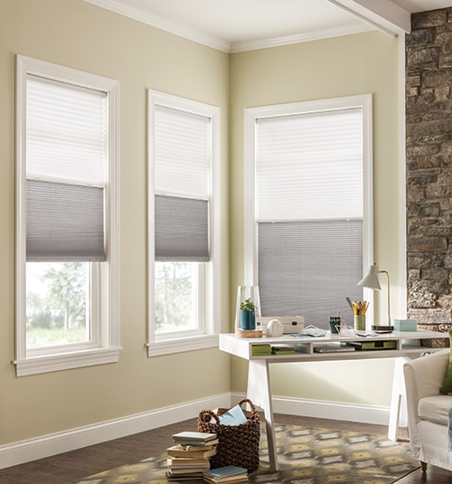 Bali Cordless Sun Up Sun Down Cellular Shades shown in light filtering Sunrise White Sugar and Dove Grey
