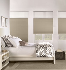 Bali Cordless Sun Up Sun Down Cellular Shades shown in color Luxe Snowbird Light Filtering and Earthy Taupe Blackout