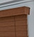LEVOLOR Classic Value Faux Wood Valance shown in Pecan with mitered valance returns