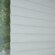 White sheer shades with closed vanes