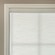Light filtering roller shade with 3&#x201D; White Cassette Fabric shown in Textured Canvas White
