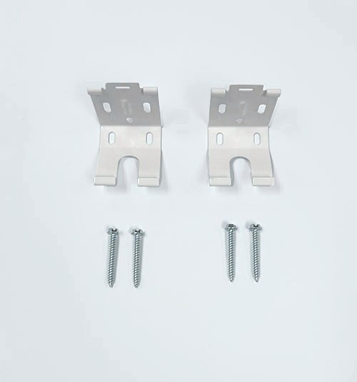 Metal roller shade brackets for shades with a cassette