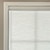 Light filtering roller shade with 3&#x201D; White Cassette Fabric shown in Textured Canvas White
