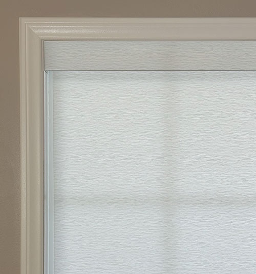 Light filtering roller shade with True Square Cassette. Fabric shown in Cascade White