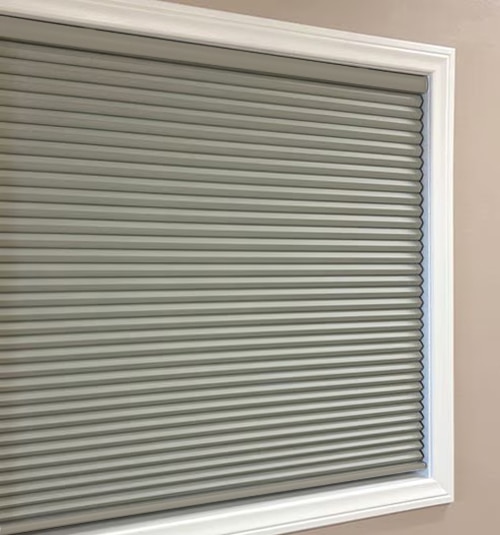 Boutique cellular shades come standard with fabric wrapped bottom rails in the selected fabric.