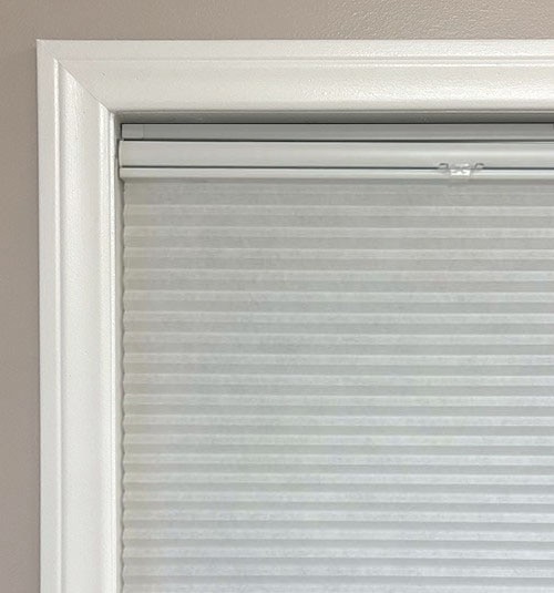 No-Drill headrail shown with Cordless Top Down Bottom Up light filtering shade shown in Snowfall