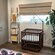 Cordless natural woven shade with blackout lining shown in Tuvalu Straw