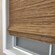 Cordless and Motorized woven shades will gently stack when raised and unfold when lowered.