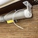 View of motorized tube under valance. Charing port and reset button can be found on the end of the motor tube. 