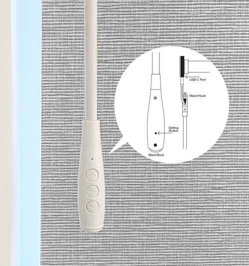 Close-up of Motorized Wand. Recharges via plug-in at the bottom of the wand. Charger not included. Color of wand is always white.