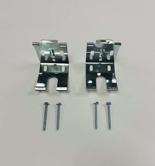 Metal roller shade brackets for shades with a cassette.
