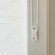Close-up of Cord Loop Tensioner. Tensioners must be wall-mounted to properly operate shade.