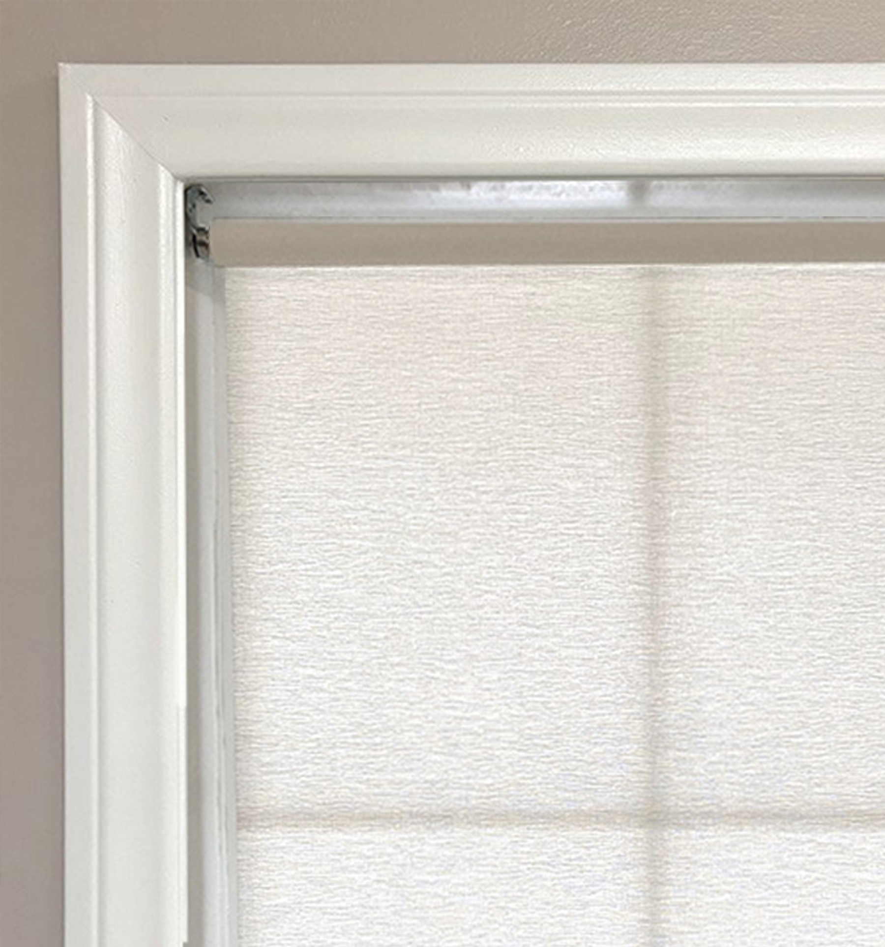 Standard Roll without Valance. Exposed rolls will have about a 1/2" to 1" gap from the top of the window frame, to the top of the roller.