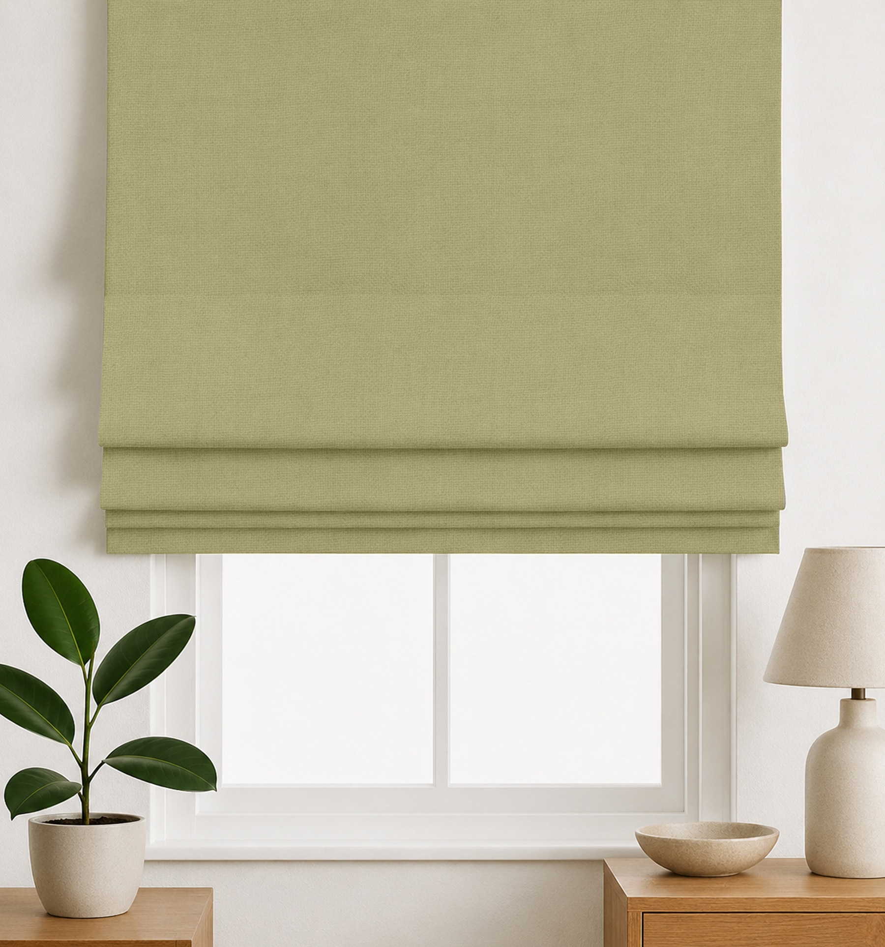 Blindsgalore Essential Roman Shades with cordless lift shown in Blackout Pale Sage