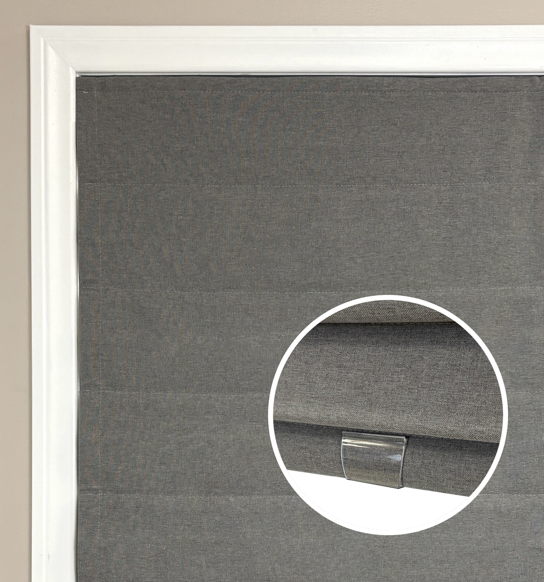 Blindsgalore Essential Cordless Roman shades come with a clear attachable handle.