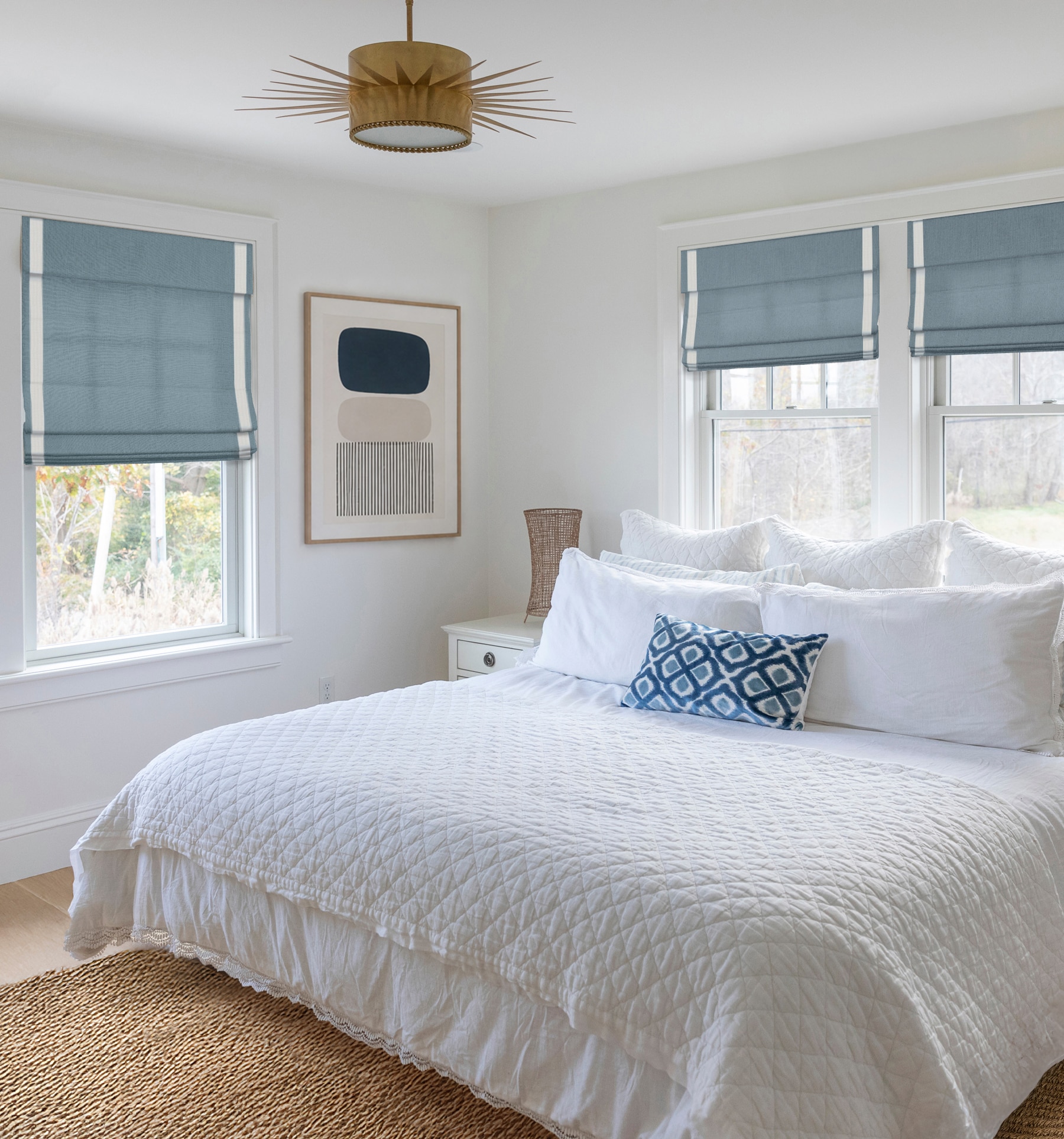Blindsgalore Luxera Roman Shades with Cordless lift shown in Spectra Ocean.
