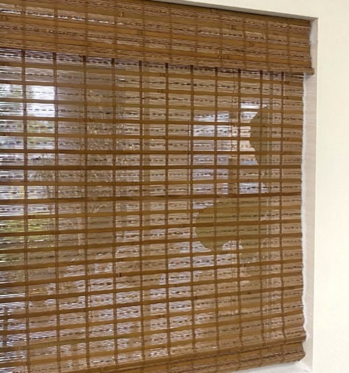 Unlined bamboo woven shade shown in Palapa