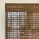 Cordless bamboo woven wood shade. 