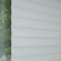 White sheer shades with closed vanes