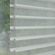 White sheer shades with open vanes