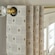 Close up of Grommet Drapery header with black grommet rings.